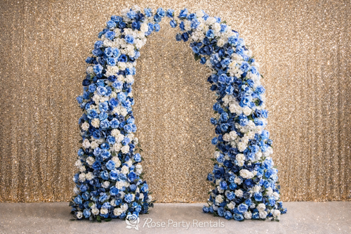 Blue and white rose arch on gold sequin