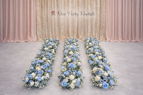 Dusty blue floral runners on champagne backdrop