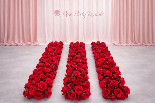 Red rose runners on blush drape